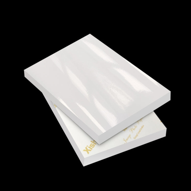 Stack of white waterproof inkjet photo paper sheets for photo-quality prints