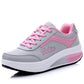 Gray and pink lace-up women's sports sneaker with chunky white platform sole