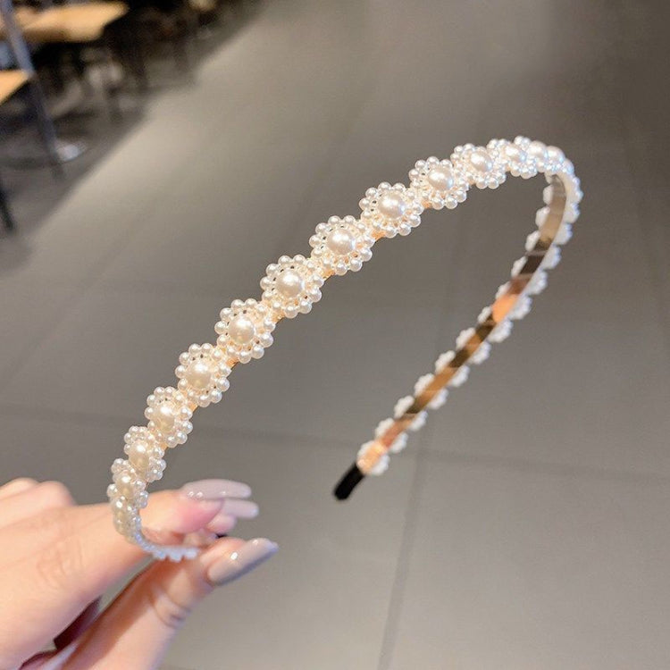 Pearl and crystal beaded headband with curved top, black comb attachment