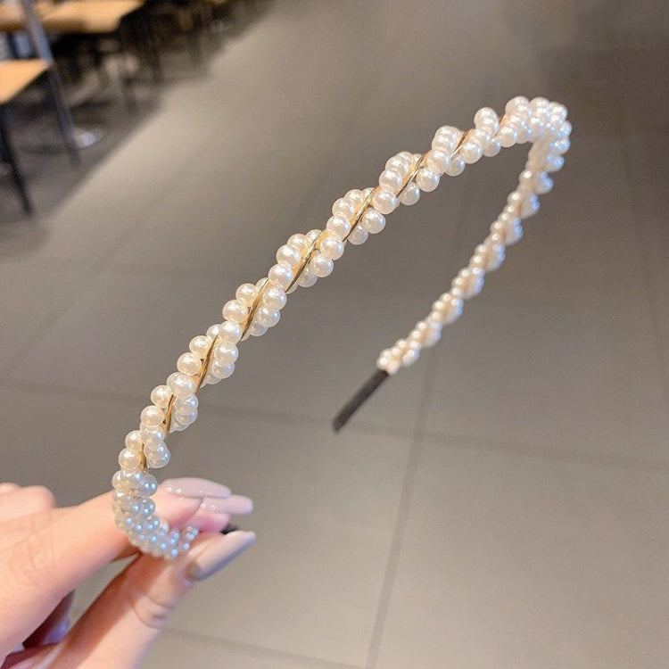 Pearl beaded headband with glossy beads, curved band and black inner comb
