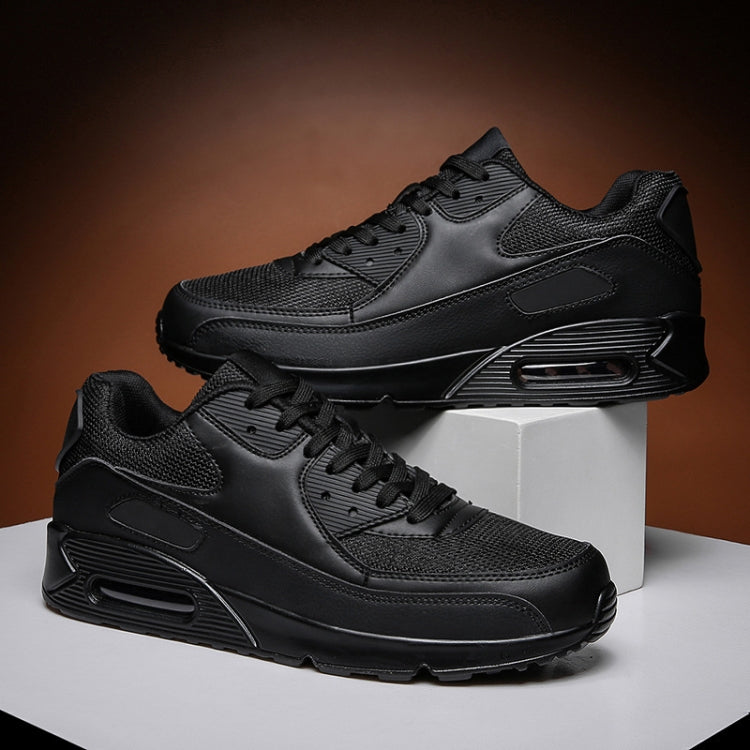 Black air-cushion sneakers, lace-up athletic shoes with textured uppers and cushioned sole
