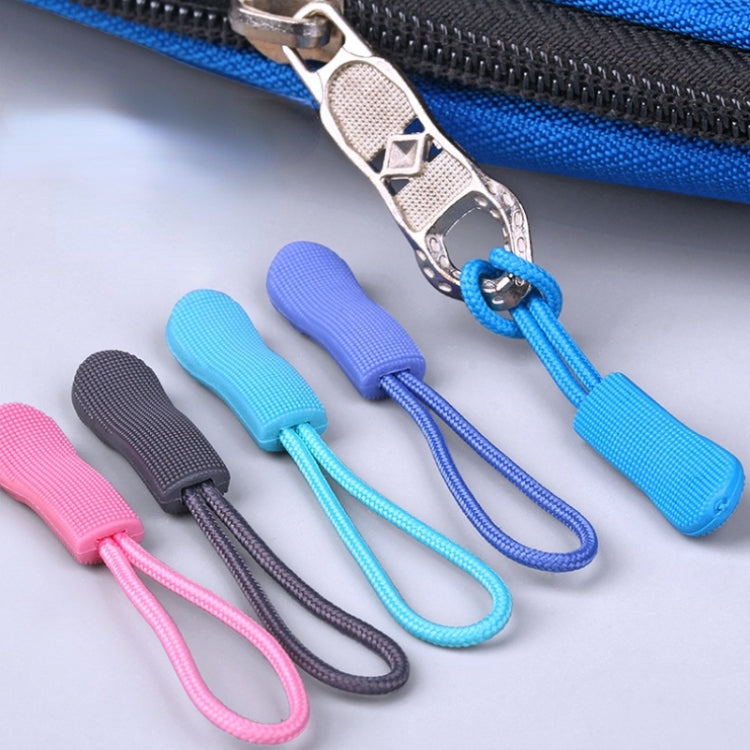 Assorted TPU zipper cord pullers with loops and handles in pink, black, blue tones