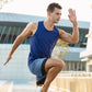Men's sports vest in blue on model, sleeveless athletic workout style