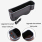 Car seat gap storage box in dark fabric with red stitching and dual USB ports