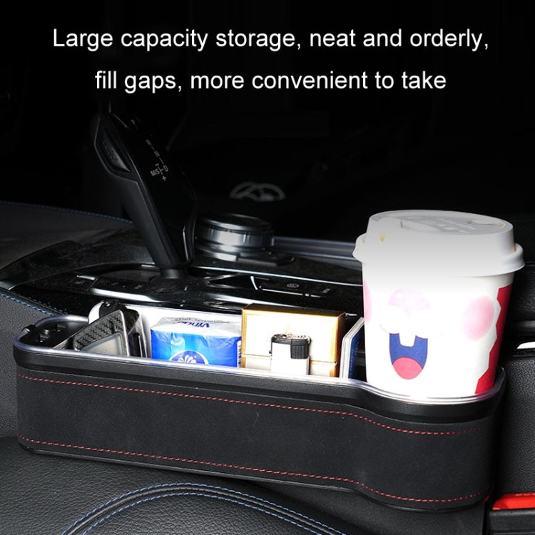 Car seat gap storage box with red-stitched trim, holding small items