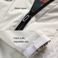 White casual jacket close-up with metal zipper and adjustable patch cuffs