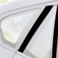 Close-up of black vertical stripe B-pillar sticker on car window trim