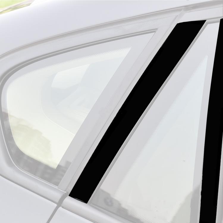 Close-up of black vertical stripe B-pillar sticker on car window trim