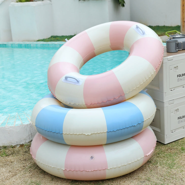 Pink and white striped inflatable kids swimming ring stacked with a blue ring