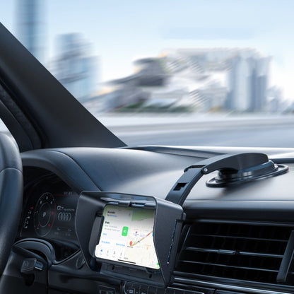 Car dashboard phone holder with black clamp and rotating cradle, mounted on air vent