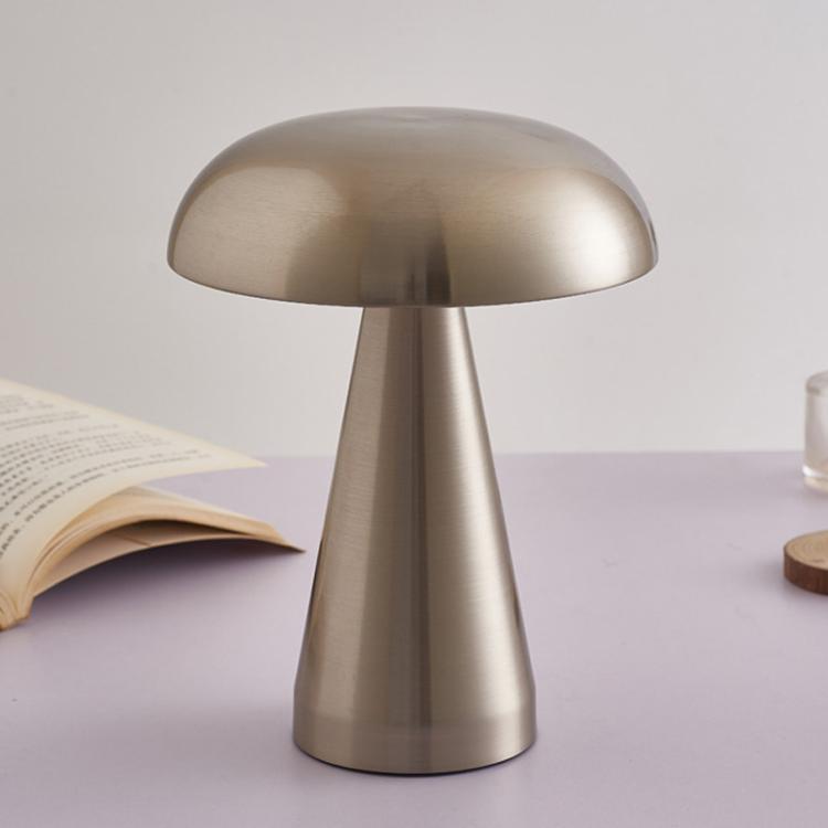 Silver mushroom-style bedside table lamp with rounded dome shade and smooth tapered stem