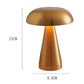 Gold mushroom table lamp with dome shade; 21 cm height and 8.5 cm base width