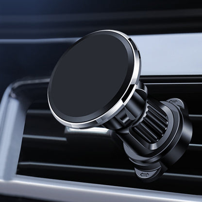 Rotatable magnetic car phone holder with black circular pad and silver metal ring