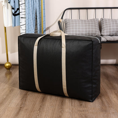 Black moving storage duffle bag with beige strap handles, boxy front view