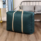 Dark green moving storage duffle bag with beige trim straps and top carry handles