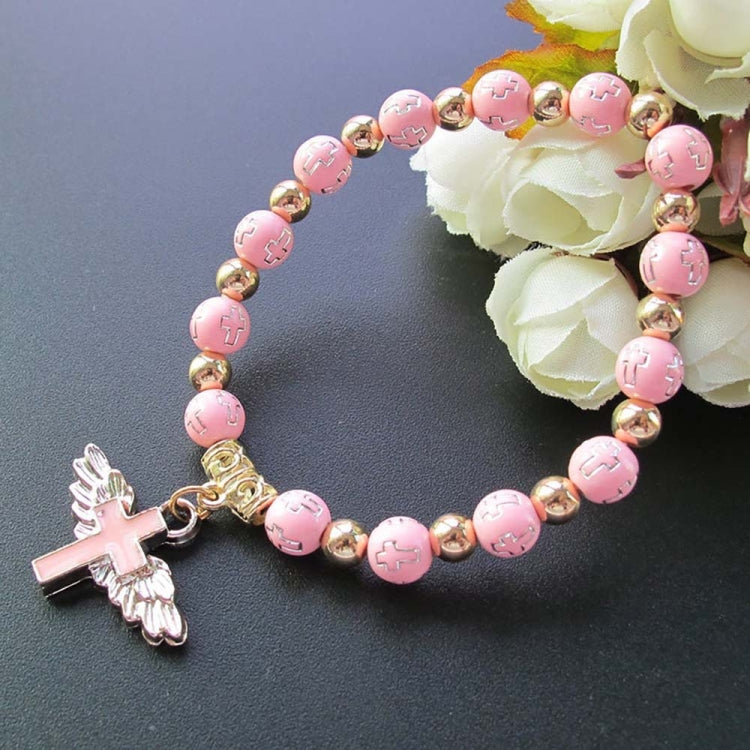 Pink bead angel cross bracelet with gold spacers and pink angel cross charm.