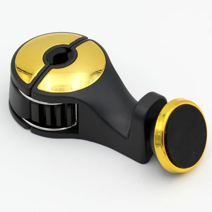 Gold car magnetic phone holder with black clamp and circular mounting disc.