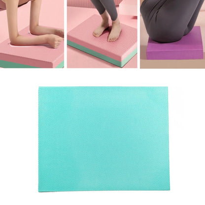 Purple fitness balance mat used for kneeling support during exercise.