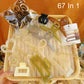 Hair clip and ring accessory set with clear, tan, and dark pieces in a box