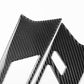Set of 4 carbon-fiber look door handle trim stickers, black, close-up.
