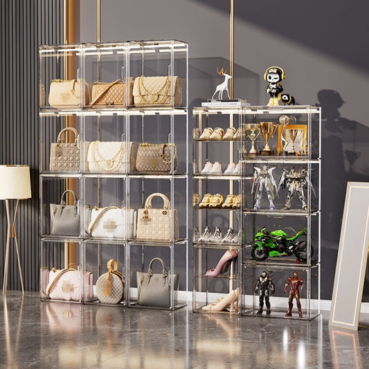 Set of clear stackable storage boxes in a cabinet, displaying bags and accessories
