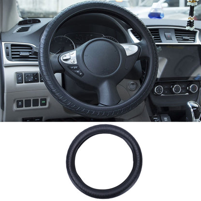 Black silicone steering wheel cover with textured non-slip grip pattern