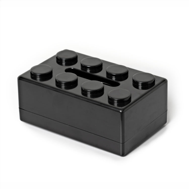 Black building-block tissue storage box with round studs and tissue slot