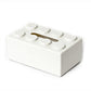 White building-block tissue storage box with round studs and tissue slot