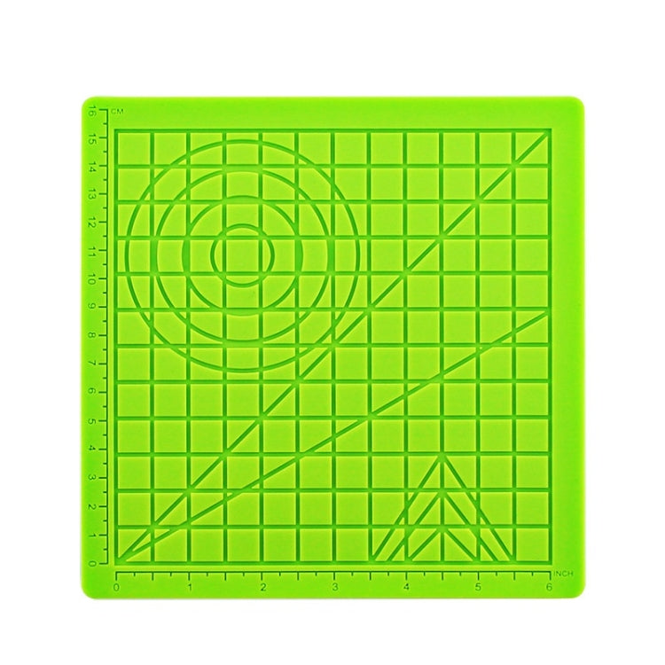Green silicone 3D drawing template mat with grid lines, circle guide, and ruler marks