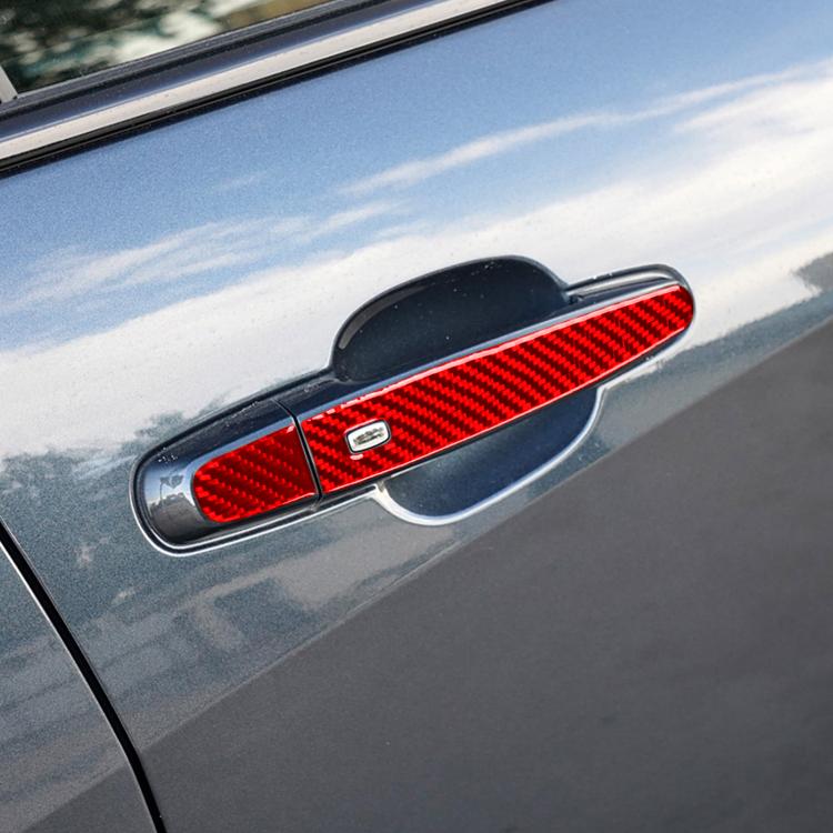 Red carbon-fiber exterior door handle sticker installed on car door handle cover