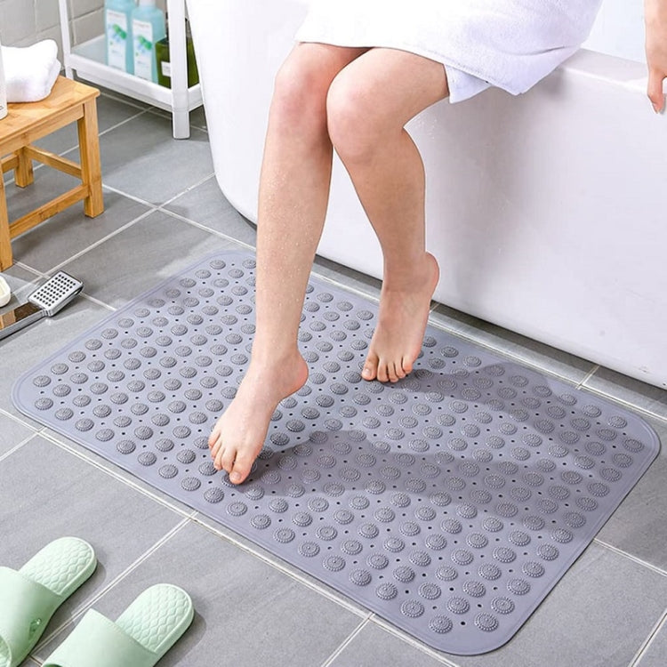 Gray PVC bathroom non-slip massage mat on floor for barefoot cushioning