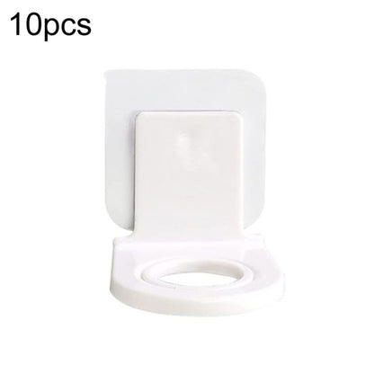 Set of 10 wall-mounted soap dispenser holders with clear adhesive patches, white