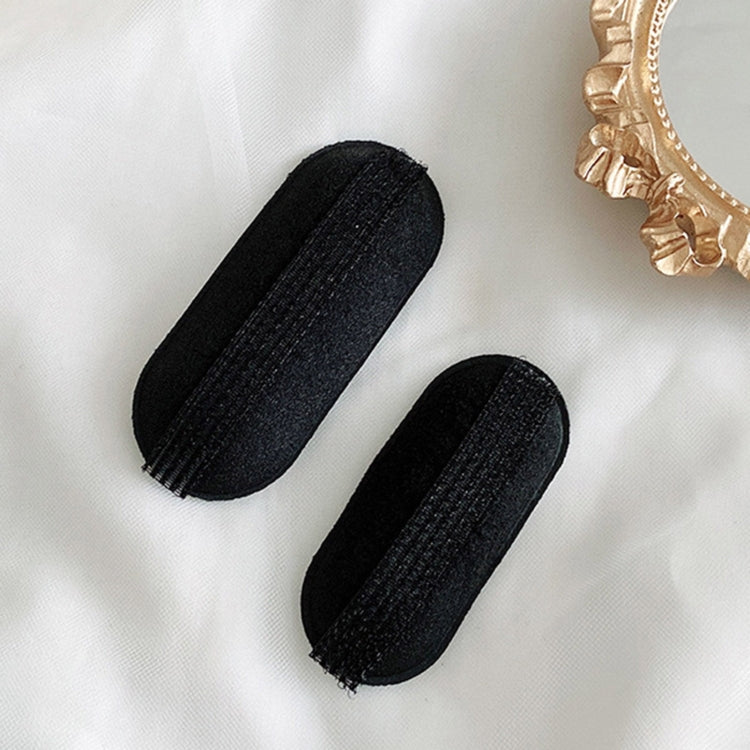 Two black sponge hairpin pads for clipping at the hair roots