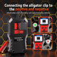 KONNWEI battery and relay tester with red clamps connected to electrodes