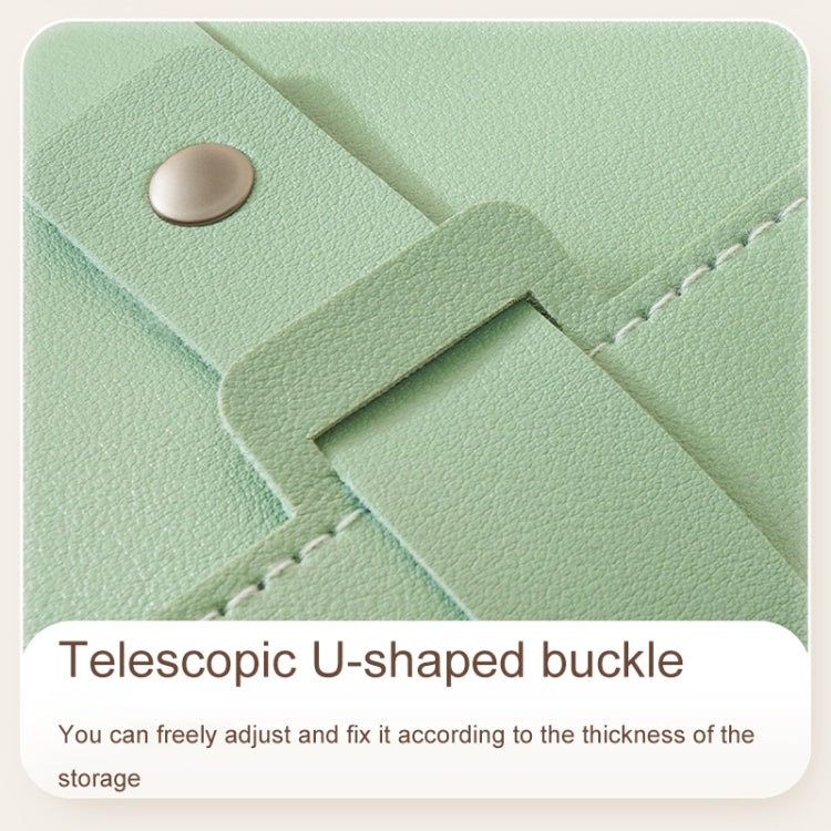 Green book-shaped jewelry bag with telescopic U-shaped buckle and adjustable strap