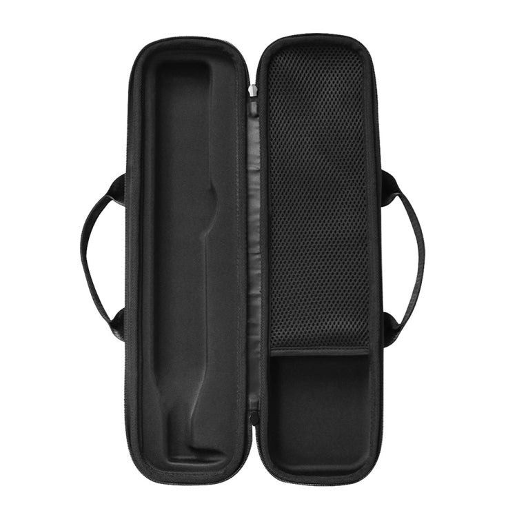 Black double-compartment storage case with zipper and carry strap loops.