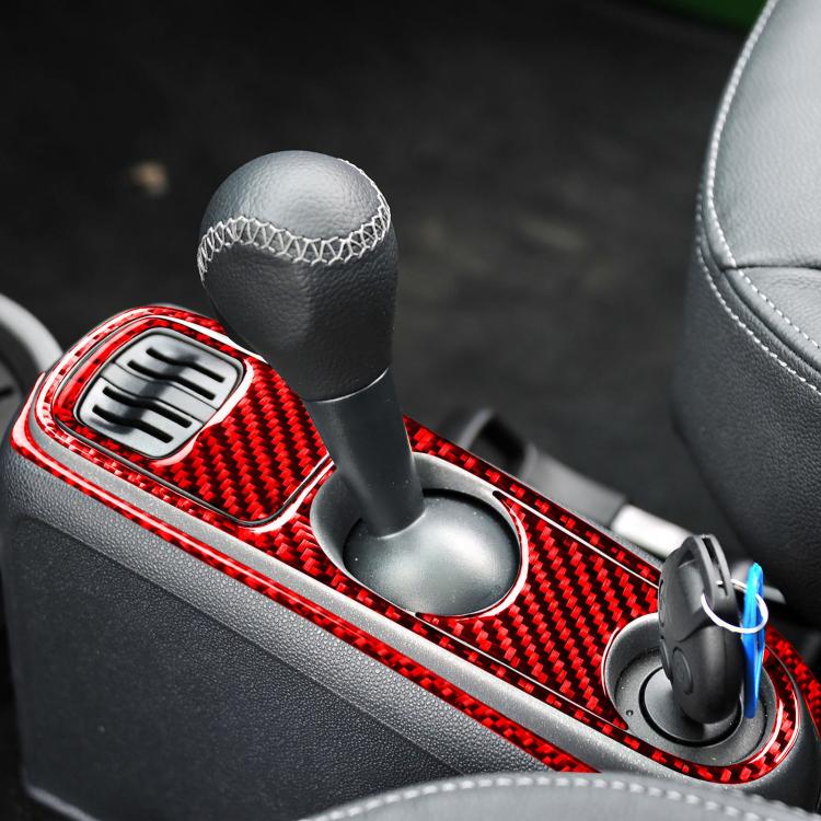 Red carbon-fiber armrest and gear console sticker trim with cutouts for switches