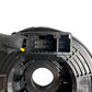 Clock spring coil connector view with multi-pin socket and yellow wire lead