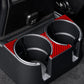 Red carbon-fiber rear cup holder stickers applied around two cup holders
