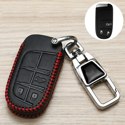 Car key cover with black leather shell, red stitched edges, and metal key ring