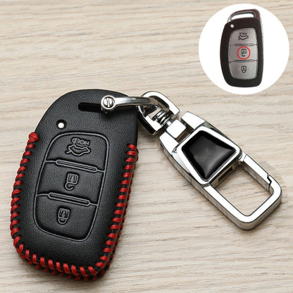 Black leather car key fob cover with red stitching, metal keyring, and button remote holder