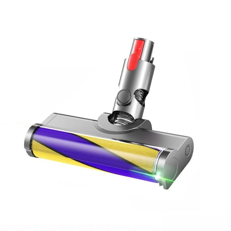 Soft brush head with green LED dust lamp, angled view, purple and yellow roller