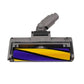 Soft brush head underside with exposed roller brush and green LED indicator edge