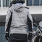 Outdoor motorcycle raincoat suit in light gray with full hood and long sleeves