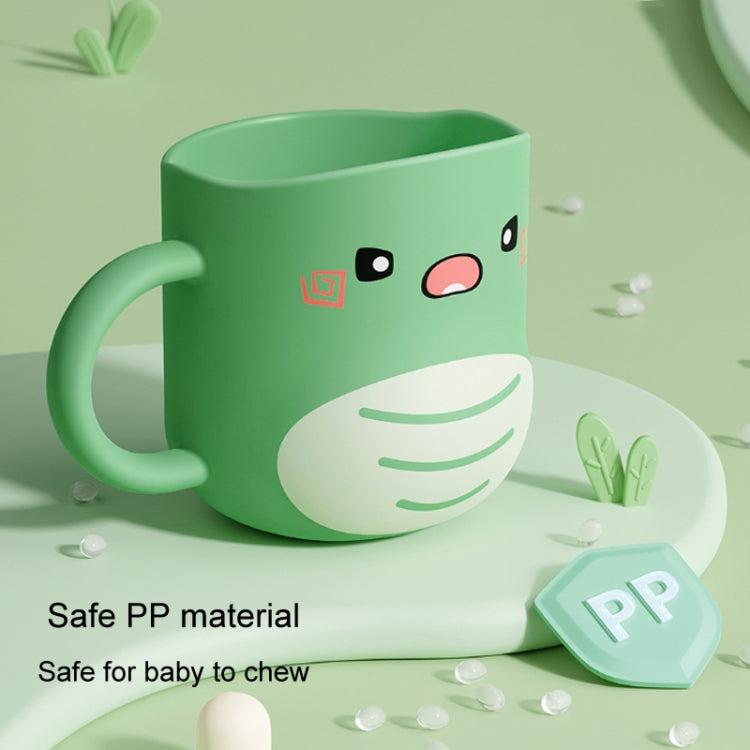 Green dinosaur baby cup with rounded base and smiling cartoon face
