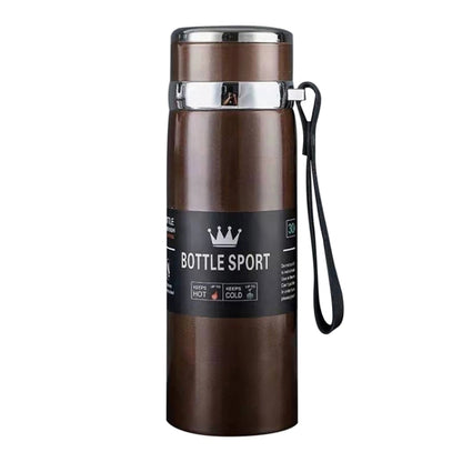 Brown vacuum insulated stainless steel mug with flip lid and black wrist strap