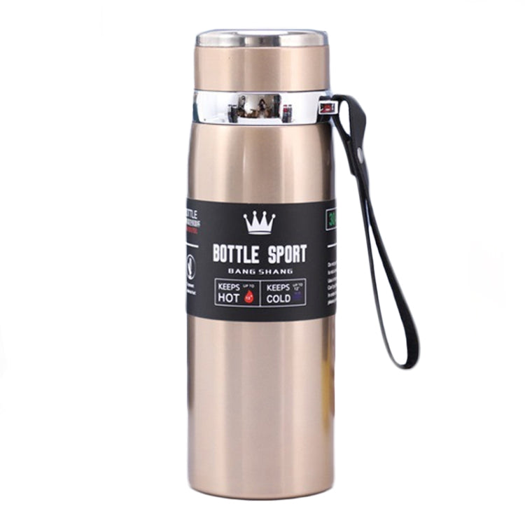 Beige vacuum insulated stainless steel mug with flip lid and black wrist strap