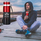 Red and black vacuum insulated water bottle mug with side carry handle loop