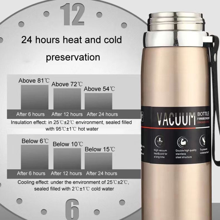 Champagne vacuum thermos mug with carry handle and black 'VACUUM' label band