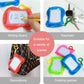 Red mini magnetic writing board with stylus, plus blue keychain writing board and keys.